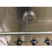 Stainless steel appliance with a temperature gauge and control knobs.