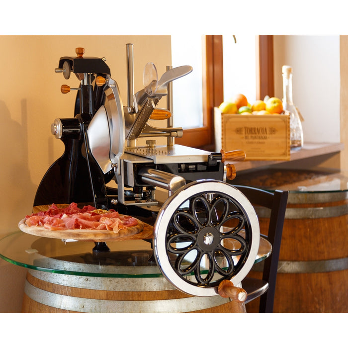 Nella 12" Manual Black Volano Meat Slicer with Flower Flywheel & Olive Wood Trim Kit - 46117 / 46631