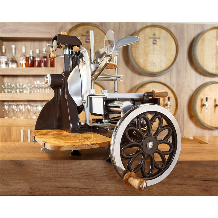 Nella 12" Manual Black Volano Meat Slicer with Flower Flywheel & Olive Wood Trim Kit - 46117 / 46631