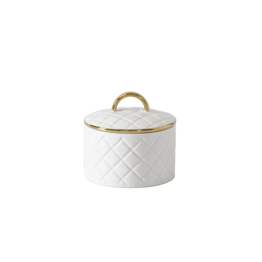 A small white lidded canister with a quilted diamond pattern, a gold trim band, and a gold loop handle, photographed on a clean white studio background.